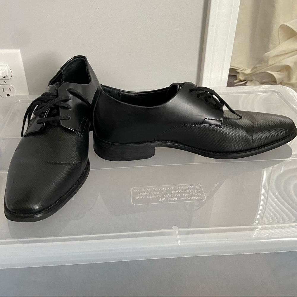 Calvin Klein black work shoe.